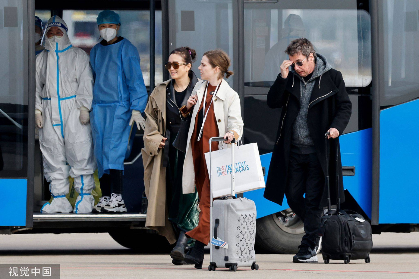 Vợ chồng Củng Lợi tháp tùng Tổng thống Pháp trong chuyến sang thăm Trung Quốc.