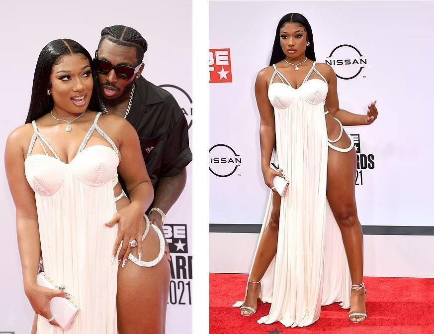 Megan Thee Stallion nổi bật trên thảm đỏ với chiếc váy trắng kem xẻ tà siêu bạo, khoe đường cong "phồn thực". Cô còn khiến dân mạng "đỏ mặt" bởi khoảnh khắc tình tứ với bạn trai Pardison Fontaine.