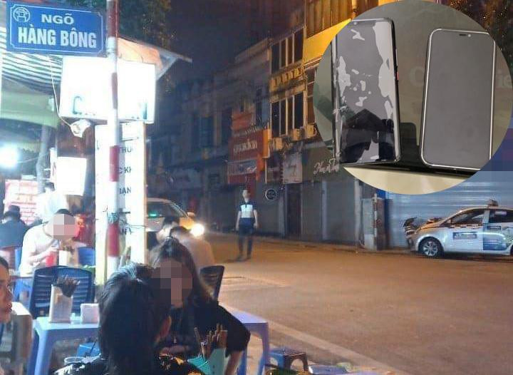 Khu vực xảy ra vụ việc và hai chiếc điện thoại tài xế taxi giao nộp.