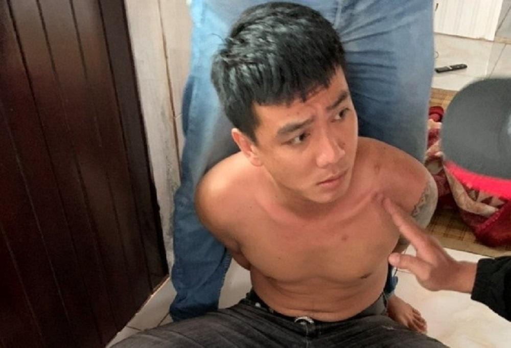 Đ.T.Q. bị bắt giữ sau khi nổ súng vào quán cà phê khiến 2 người bị thương. (Ảnh: L.P)