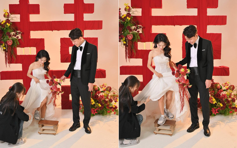 Cô dâu đứng trên 3 cái ghế để tương xứng với chú rể