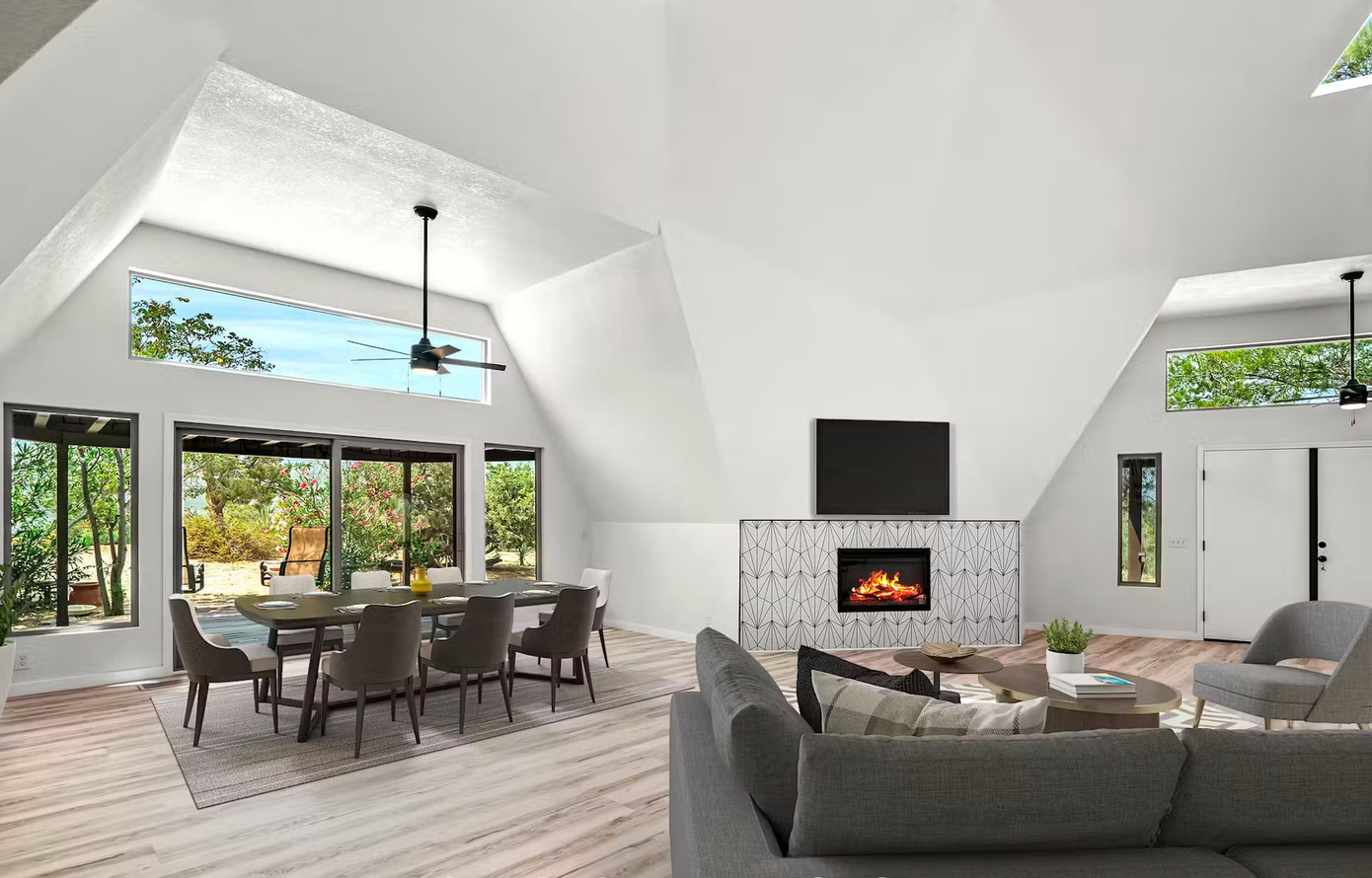 Không gian phòng khách và phòng ăn nối liền trong một không gian hướng ra bên ngoài.