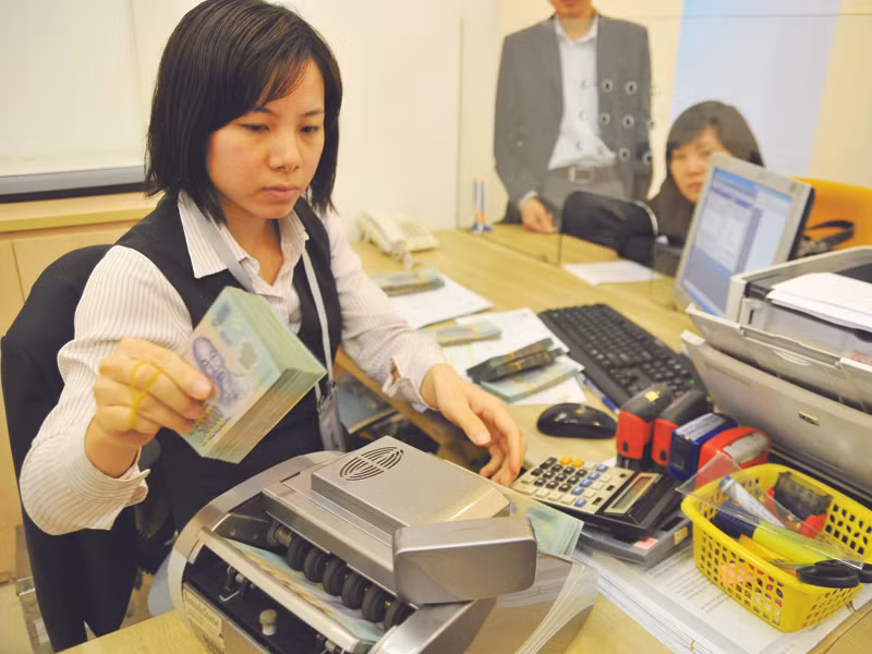 DN nhà nước chiếm 60% dư nợ tín dụng của ngân hàng. Ảnh: Hải Anh. DN nhà nước chiếm 60% dư nợ tín dụng của ngân hàng. Ảnh: Hải Anh