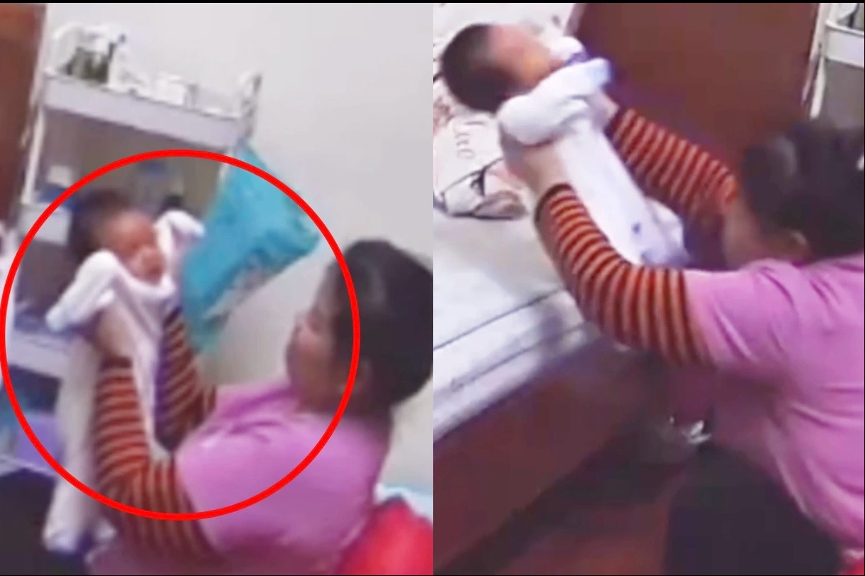 Hình ảnh camera ghi lại bà L. có hành vi bạo hành cháu bé. Hình ảnh camera ghi lại bà L. có hành vi bạo hành cháu bé.