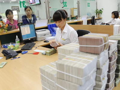 Theo NHNN, các ngân hàng không trích lập đủ dự phòng rủi ro sẽ không được chia cổ tức. Ảnh: Hồng Vĩnh