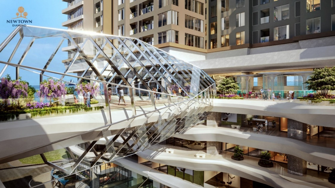 Màu xanh được đan cài nổi bật tại các tầng trung tâm thương mại hay cầu kính ở khối đế, tạo nên một không gian tổng thể dịu mát, thanh thoát, nhẹ nhàng và thư thái