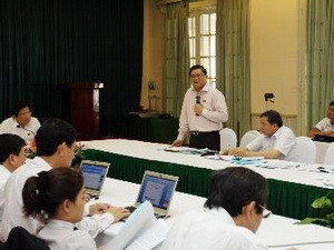 Đại biểu Quốc hội các tỉnh Cao Bằng, Quảng Bình, Kon Tum, An Giang thảo luận tại tổ. Ảnh: Trọng Đức/TTXVN