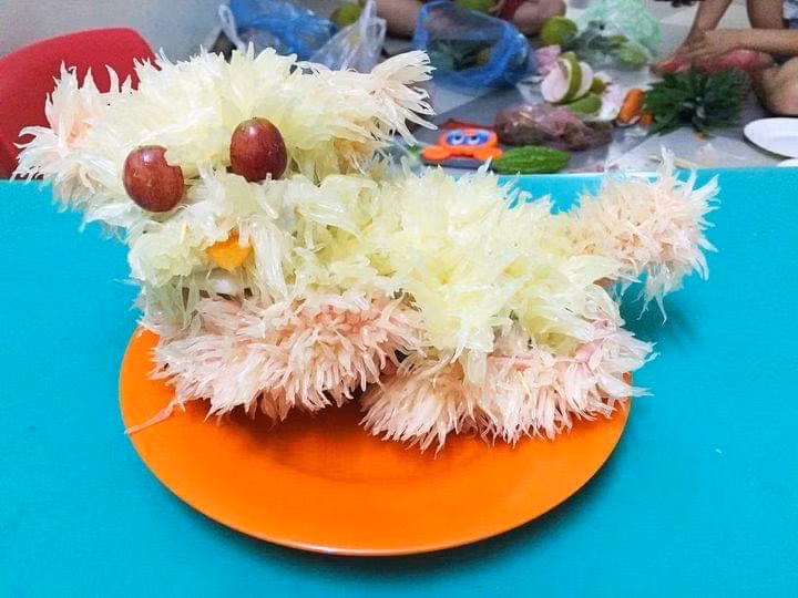 Chó bưởi... mắc mưa.