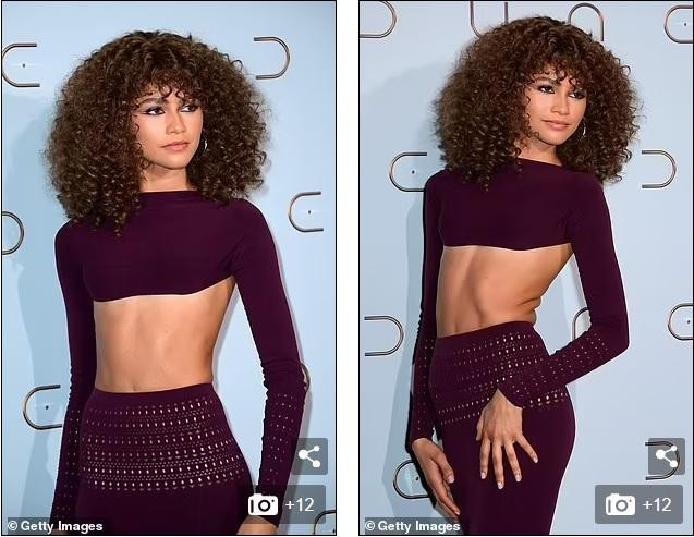 Cô để mái tóc xoăn phồng "mì tôm" đậm phong cách người Mỹ gốc Phi. Gương mặt trang điểm nhẹ nhàng, nhấn vào đôi mắt sắc sảo.