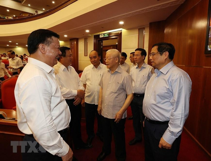 Tổng Bí thư Nguyễn Phú Trọng, Chủ tịch nước Nguyễn Xuân Phúc, Thủ tướng Phạm Minh Chính và Thường trực Ban Bí thư Võ Văn Thưởng cùng các đại biểu dự hội nghị. Ảnh : Trí Dũng/TTXVN Tổng Bí thư Nguyễn Phú Trọng, Chủ tịch nước Nguyễn Xuân Phúc, Thủ tướng Phạm Minh Chính và Thường trực Ban Bí thư Võ Văn Thưởng cùng các đại biểu dự hội nghị. Ảnh : Trí Dũng/TTXVN