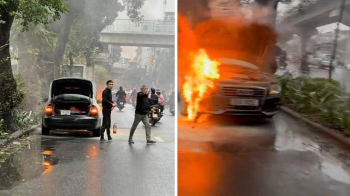 Khoảnh khắc chiếc xe sang Audi bốc cháy trên đường Láng (TP Hà Nội). Ảnh: Báo Giao thông Khoảnh khắc chiếc xe sang Audi bốc cháy trên đường Láng (TP Hà Nội). Ảnh: Báo Giao thông