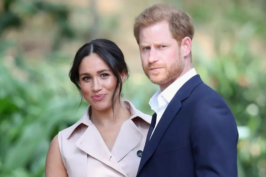 Harry và Meghan có thể không được mời dự lễ đăng quang của vua cha. Ảnh: Getty Images.
