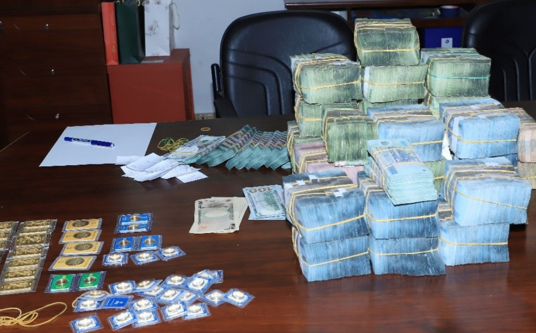 Tiền, đô la, vàng thu giữ tại công ty Lộc Phúc