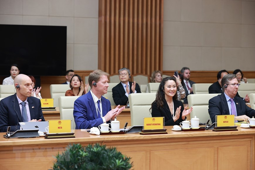 Phái đoàn doanh nghiệp Mỹ trong cuộc gặp với Thủ tướng Phạm Minh Chính chiều 22/3 (ảnh: TTXVN).