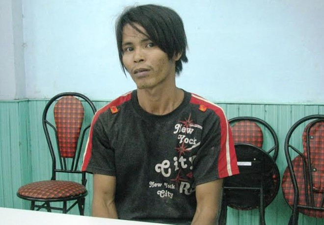 Tống Duy Tân tại cơ quan công an. 