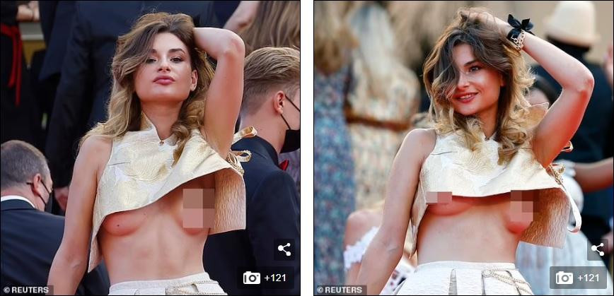 Một khách mời vô danh mặc áo siêu ngắn, lộ nguyên vòng một phản cảm trên thảm đỏ. Một khách mời vô danh mặc áo siêu ngắn, lộ nguyên vòng một phản cảm trên thảm đỏ.