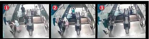 Mẹ mải dùng điện thoại, con ngã thang cuốn tử vong ảnh 1