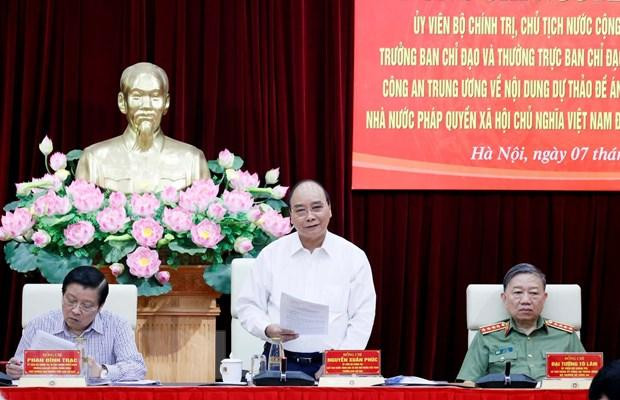 Chủ tịch nước Nguyễn Xuân Phúc làm việc với Đảng ủy Công an Trung ương về hoàn thiện Đề án xây dựng Nhà nước pháp quyền. (Ảnh: Thống Nhất/TTXVN)