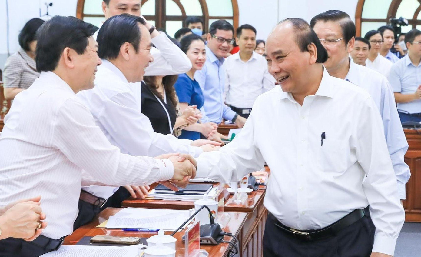 Chủ tịch nước Nguyễn Xuân Phúc và các đại biểu tham dự cuộc làm việc. Chủ tịch nước Nguyễn Xuân Phúc và các đại biểu tham dự cuộc làm việc.