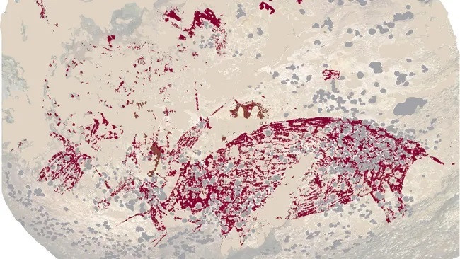 Nghệ thuật hang động 51.200 năm tuổi ở Leang Karampuang, Sulawesi, là nghệ thuật đá lâu đời nhất từng được phát hiện. Tác phẩm nghệ thuật mô tả một hình người giống người đang tương tác với một con lợn mụn cóc. (Ảnh: Được cung cấp bởi Đại học Griffith; (CC-BY 4.0 Deed) )