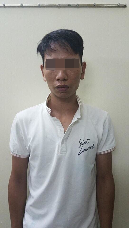 Trần Văn Phong tại cơ quan công an.