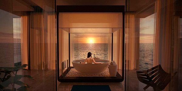 Phòng tắm hướng thẳng ra biển, du khách có thể ngắm hoàng hôn mỗi chiều.