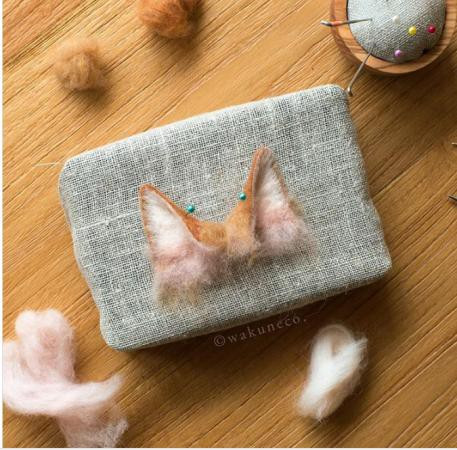 Làm ra đôi tai mèo y như thật.