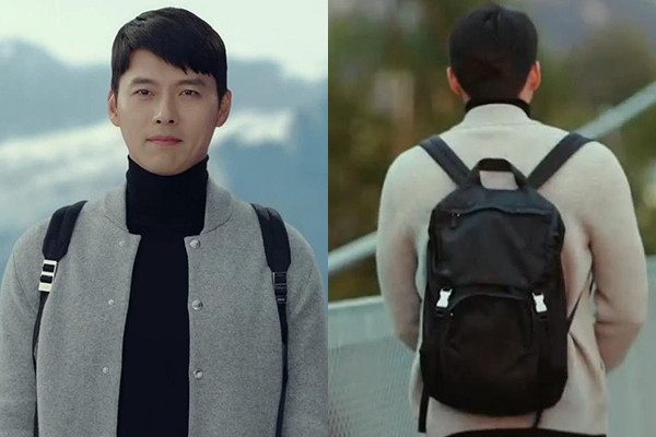Áo khoác bóng chày của Brunello Cucinelli được nam diễn viên kết hợp cùng ba lô Prada tạo nên hình ảnh trẻ trung, năng động. 