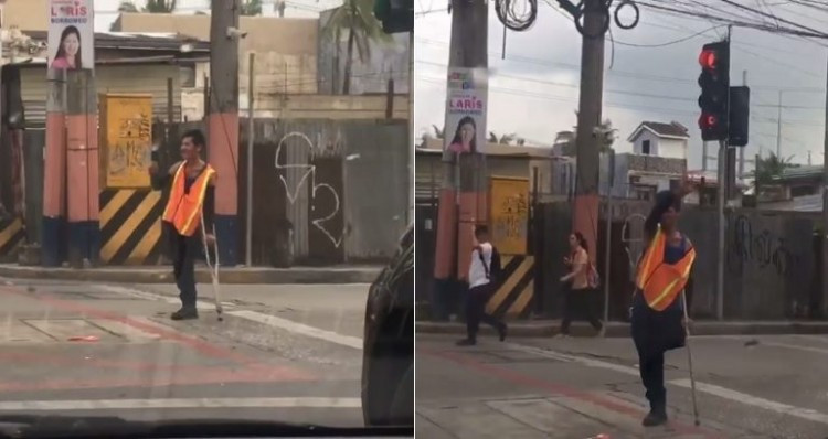 Người đàn ông khuyết tật tận tình giúp đỡ các phương tiện giao thông bất kể mưa nắng. Ảnh: Facebook.