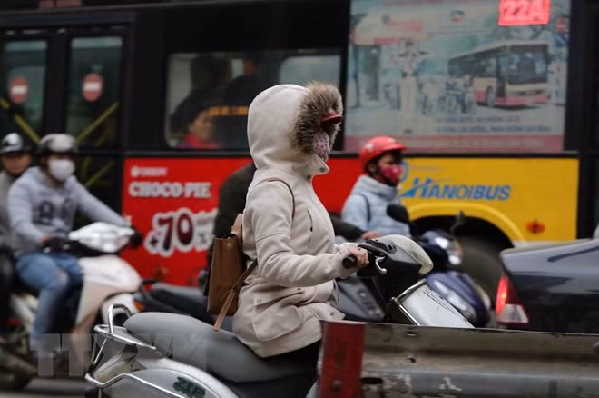 Miền Bắc, miền Trung đón năm mới 2019 trong mưa rét ảnh 2
