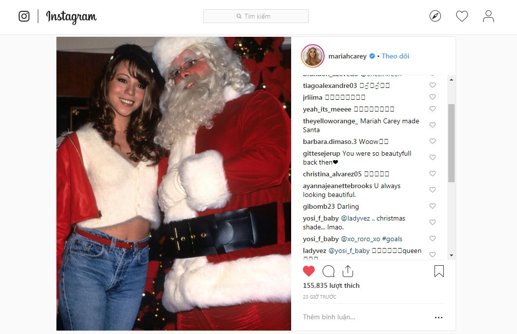Mariah Carey đã chia sẻ tấm hình của cô ấy chụp với ông già Nô-en trong những năm đầu của thập niên 90.
