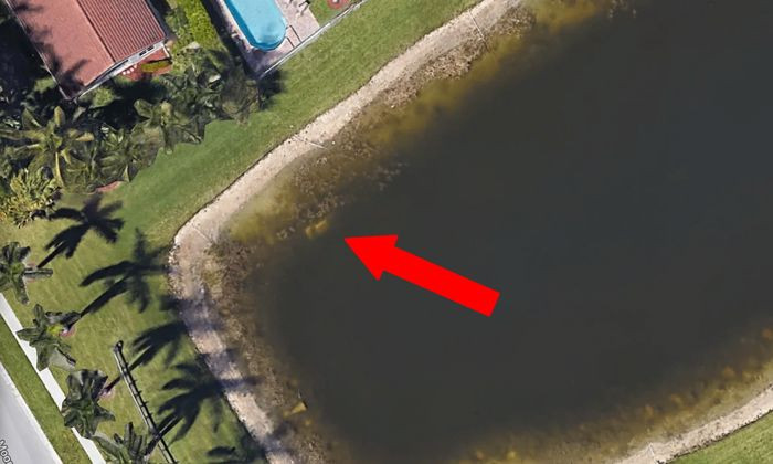 Vị trí chiếc xe và nạn nhân chìm sâu dưới lòng hồ trong suốt 20 năm qua. (Ảnh: Google) Vị trí chiếc xe và nạn nhân chìm sâu dưới lòng hồ trong suốt 20 năm qua. (Ảnh: Google)