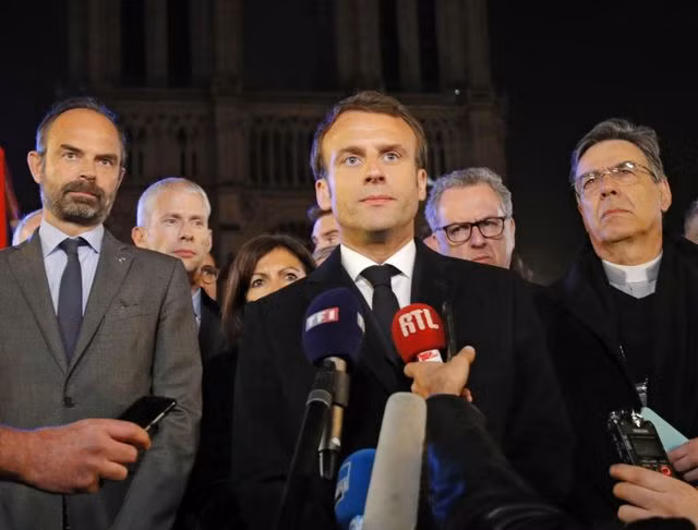Tổng thống Pháp Emmanuel Macron tuyên bố quyết tâm khôi phục lại nhà thờ trong 5 năm. Ảnh: PBS.