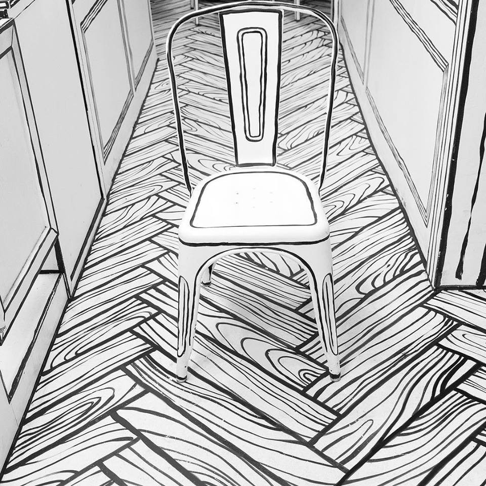 Từ bàn ghế đến tách cafe đều được chăm chút với viền đen để tạo cảm giác như tranh vẽ. Ảnh: @jolintomato