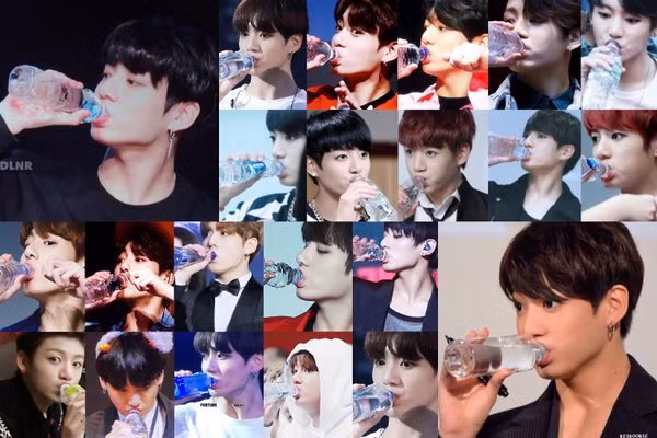Cách uống nước của Jungkook cũng chẳng giống mọi người chút nào. Anh chàng sẽ mở rộng miệng để ngậm chặt cả phần miệng chai, khiến cho đôi má phúng phính như bánh bao nhìn dễ cưng hết biết.