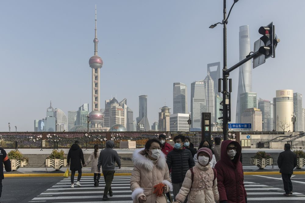 Các chuyên gia lo ngại về điều sẽ xảy ra khi hàng trăm triệu người Trung Quốc quay trở lại các thành phố lớn như Bắc Kinh hay Thượng Hải sau kỳ nghỉ Tết Nguyên đán. Ảnh: Bloomberg.