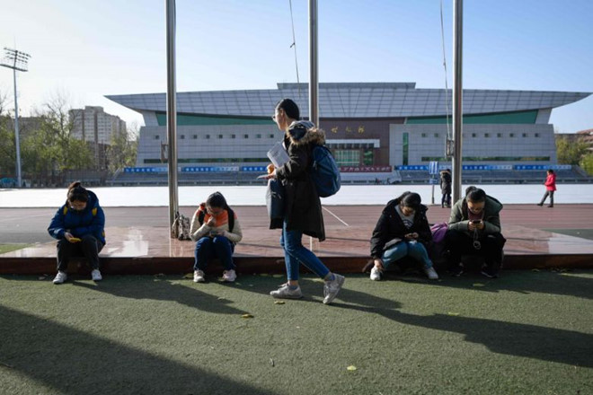 Năm 2017, 30% số người lớn Trung Quốc thừa cân và 11,9% béo phì. Ảnh: AFP.