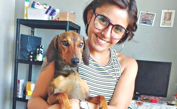 Gaspar và cô chủ Janis Cavieres.