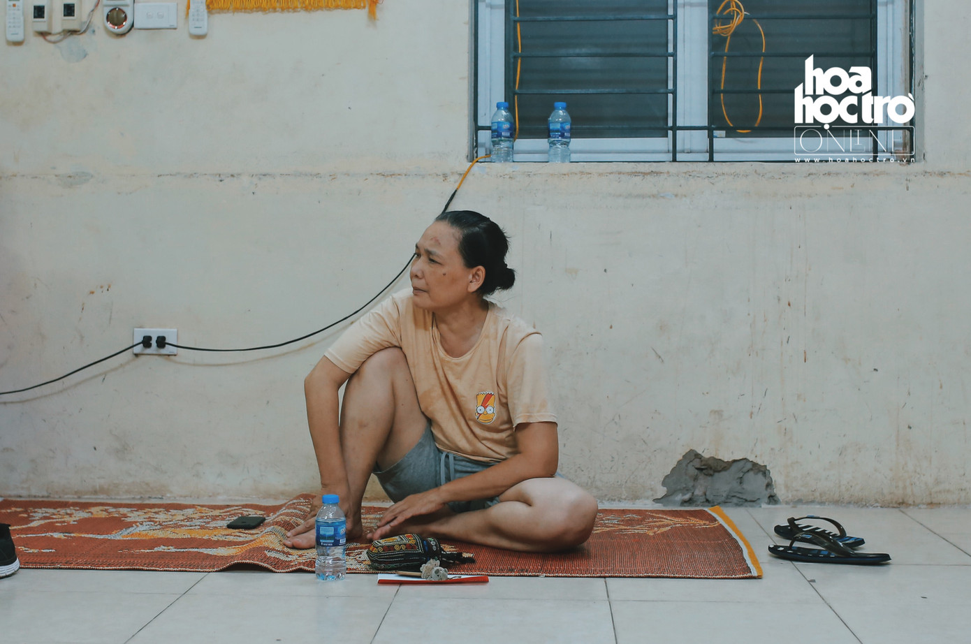 Cô Trần Kim Chi (sinh năm 1963) chỉ biết chạy thoát thân.