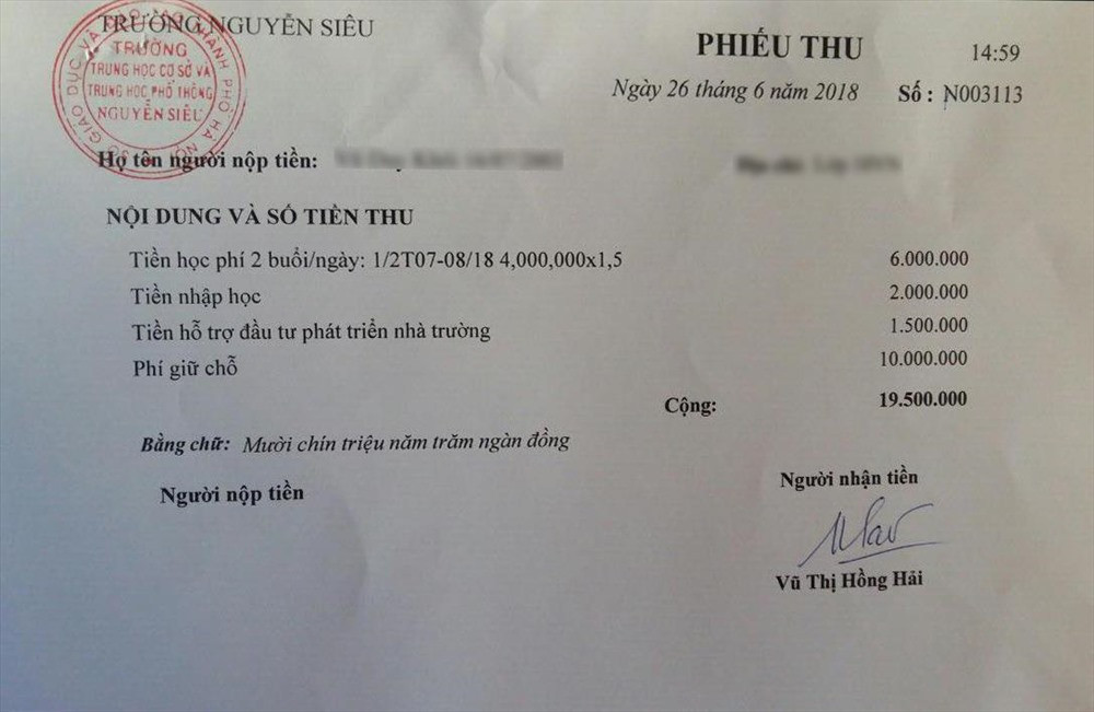 Phiếu thu các khoản phí của trường Tiểu học - THCS - THPT Nguyễn Siêu. Ảnh: Lao Động.