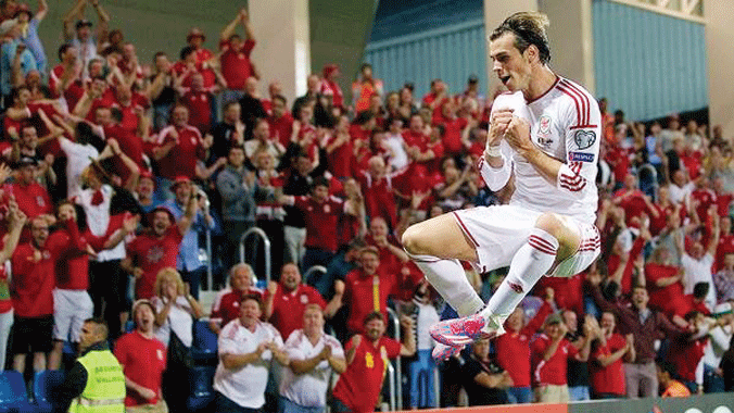 Bale có cách ăn mừng giống Ronaldo. Ảnh: AP