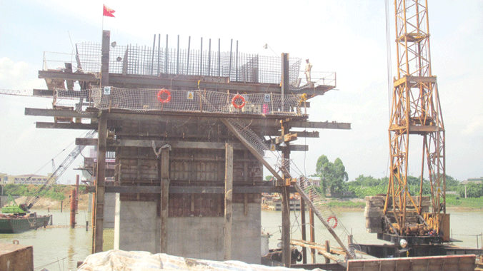 Nợ đọng xây dựng cơ bản khiến nhiều doanh nghiệp điêu đứng. Ảnh: Sỹ Lực