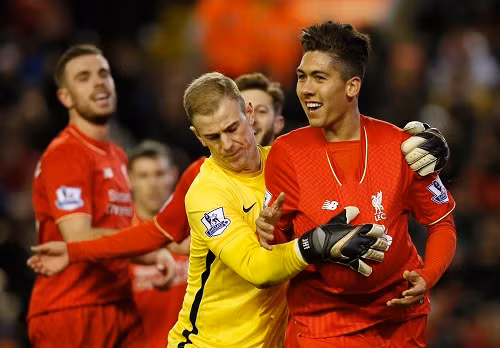 Thủ môn Joe Hart chạy theo lấy bóng sau khi Firmino ghi bàn. Ảnh: Reuters.