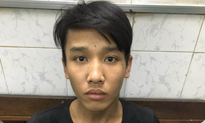 Đối tượng Nguyễn Tuấn Hoàng tại cơ quan điều tra. Ảnh: Q.T