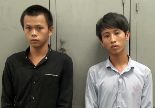 Hai tên cướp bị cảnh sát bắt giữ. Ảnh: C.A