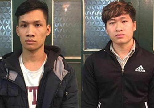 Hai bị can tại cơ quan công an. Ảnh: Trung Việt.