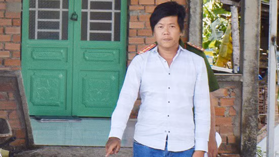 Trung bị công an khởi tố bắt tạm giam. Ảnh công an cung cấp