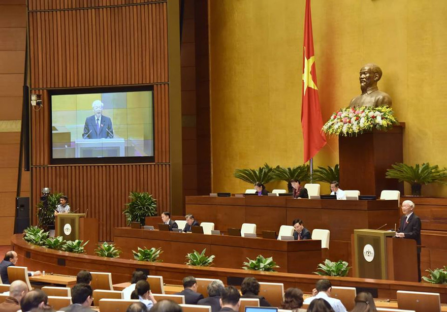 Chủ tịch nước Nguyễn Phú Trọng đọc tờ trình trước Quốc hội về việc thông qua CPTPP. Ảnh: Như Ý