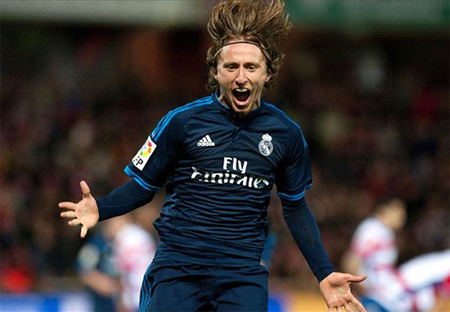 Modric chia vui sau pha ghi bàn quyết định. Ảnh: Reuters