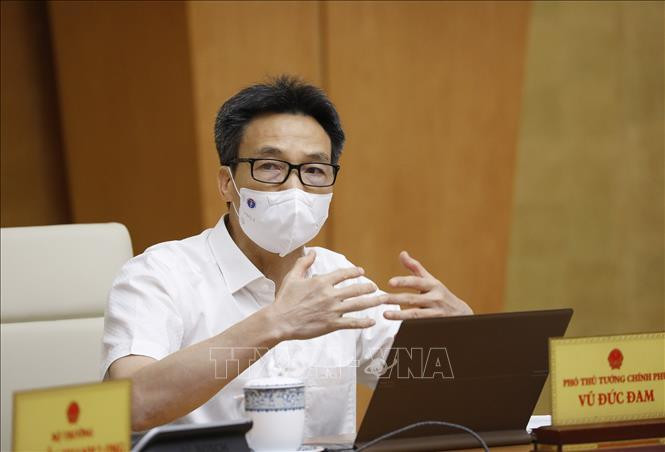 Phó Thủ tướng Vũ Đức Đam dự họp ở điểm cầu Hà Nội (ảnh TTXVN)